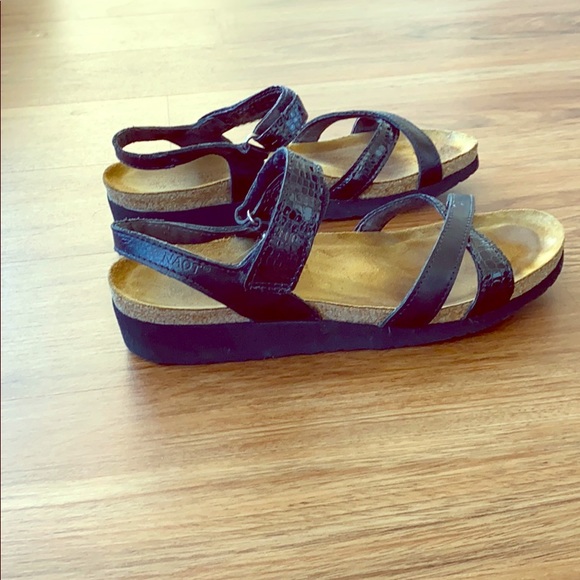 Black NAOT sandals size 9 with straps at ankle